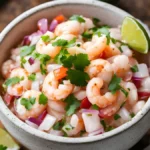 Close-up of diced red onion, cilantro, and jalapeño for ceviche.