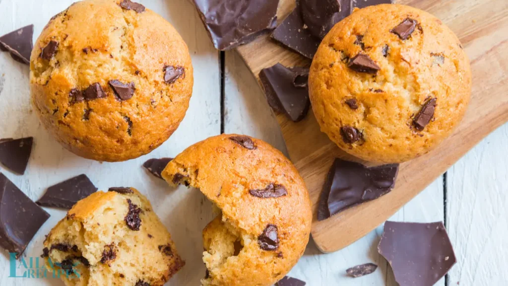 Perfectly risen chocolate chip muffins with a domed top.