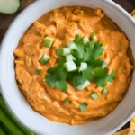 Step-by-step process of making Buffalo Chicken Dip in a slow cooker.